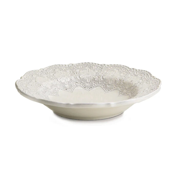 Arte Italica Merletto pasta or soup bowl featuring an intricate lace-like design in a soft white finish.