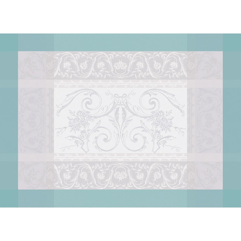 Elegant Garnier Thiebaut Jardin de La Reine placemat featuring intricate floral designs in soft colors on a textured background.