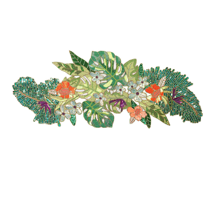 Colorful embroidered floral runner featuring tropical leaves and flowers, ideal for enhancing table decor.