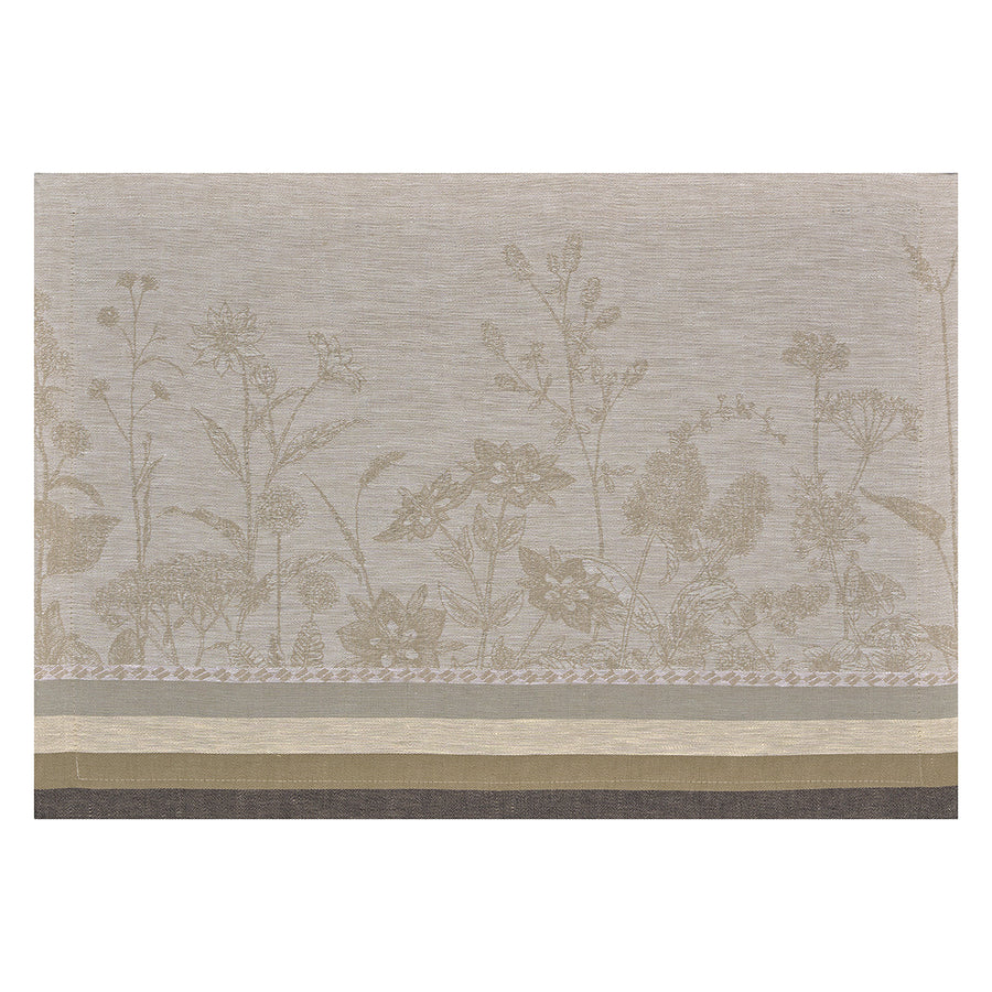 Beige placemat featuring a floral design with delicate plants and flowers, complemented by subtle striped borders.
