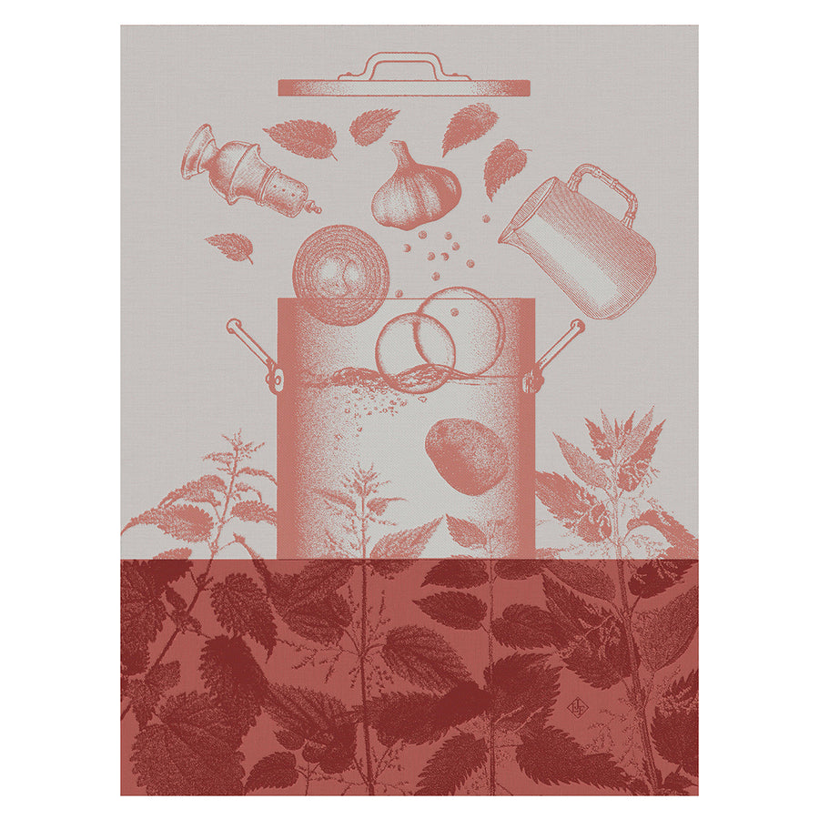 Pink tea towel featuring a whimsical illustration of kitchen items and vegetables above a leafy design.