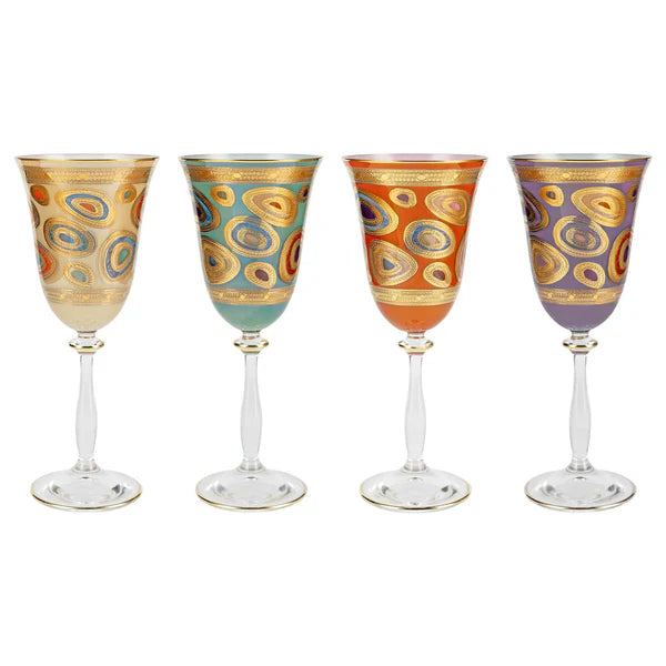 Set of four Vietri Regalia assorted wine glasses featuring vibrant colors and intricate gold patterns on elegant stems.