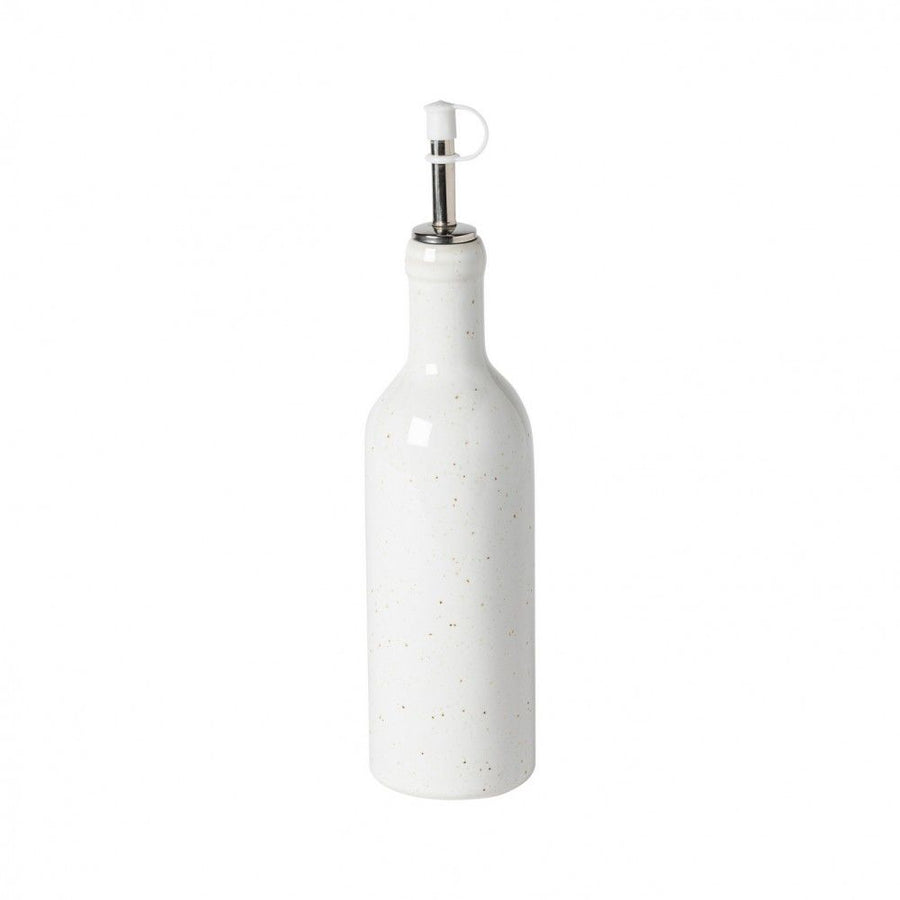 White ceramic cruet with a glossy finish and speckled design, featuring a metal spout for easy pouring.