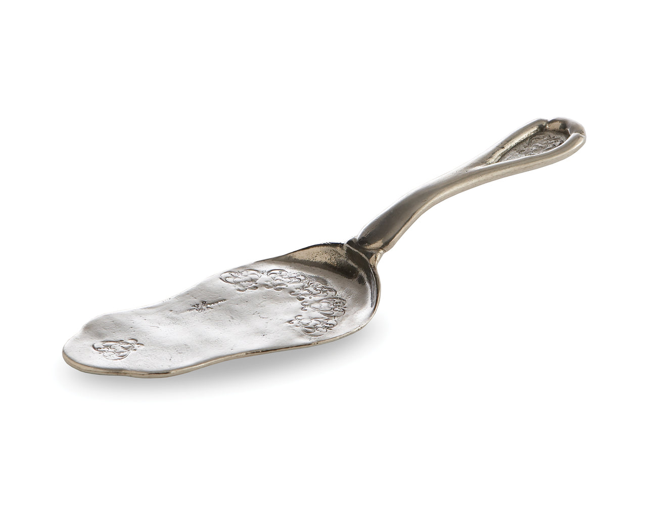 Vintage pastry server by Arte Italica featuring an ornate handle and a textured serving surface. Ideal for elegant desserts.