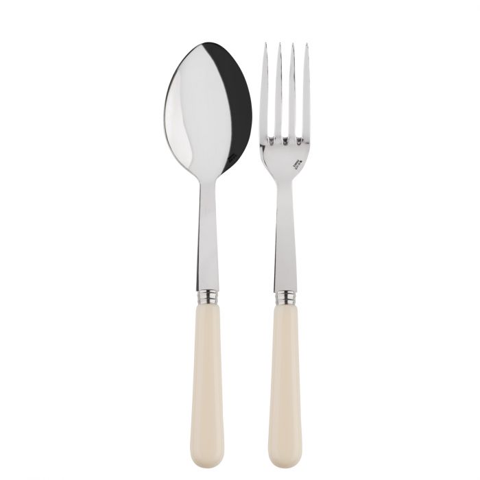 Silver serving spoon and fork with cream-colored handles from the Sabre Paris Pop Unis collection.
