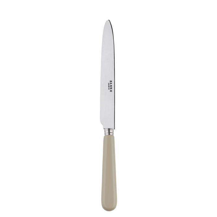 Stainless steel dinner knife with a sleek blade and a beige handle, designed for everyday dining use.