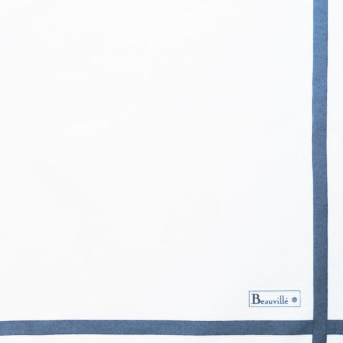 Beauville Nuit Etoilee Blue tablecloth featuring a white background with a dark blue border and logo.