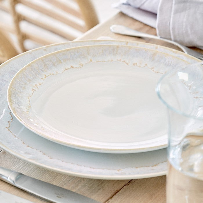 Elegant Casafina Taormina serving bowl with a subtle, textured rim, perfect for enhancing any dining table setting.