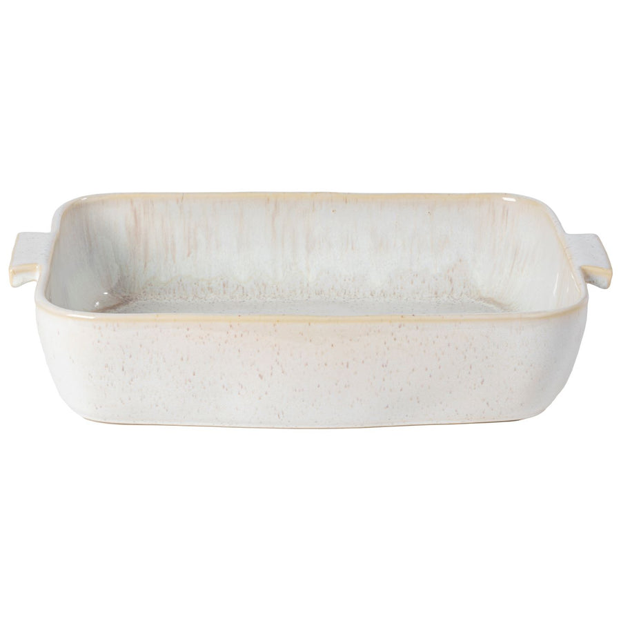 Rectangular ceramic baker in a soft white glaze with subtle speckles and handles for easy serving.