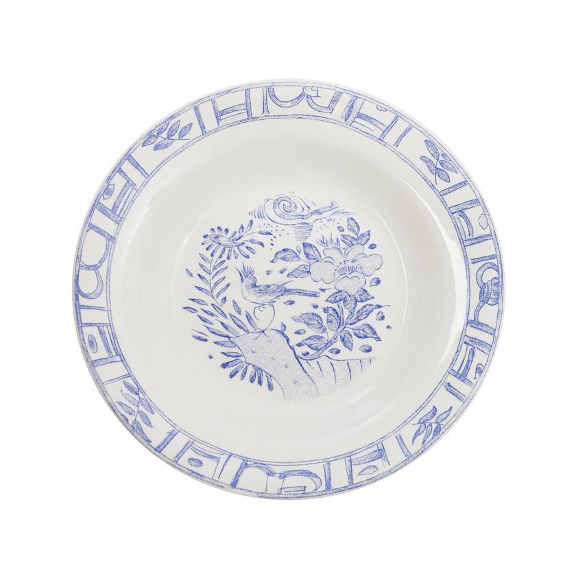 Gien Oiseau Bleu rimmed soup bowl featuring a delicate blue floral and bird design on a white background.
