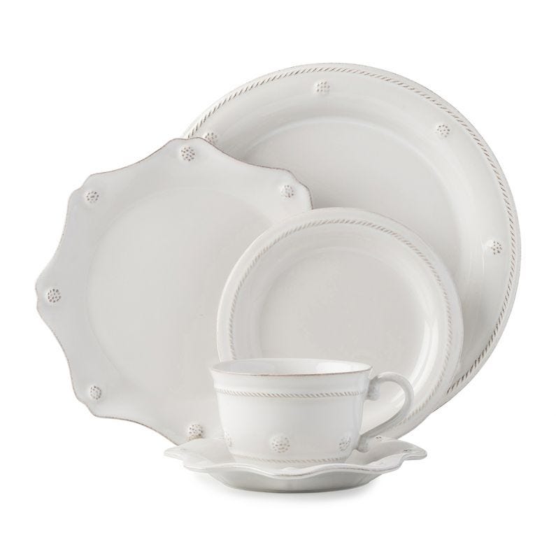 Juliska Berry & Thread 5-piece place setting featuring elegant white porcelain plates, cup, and saucer with textured detailing.