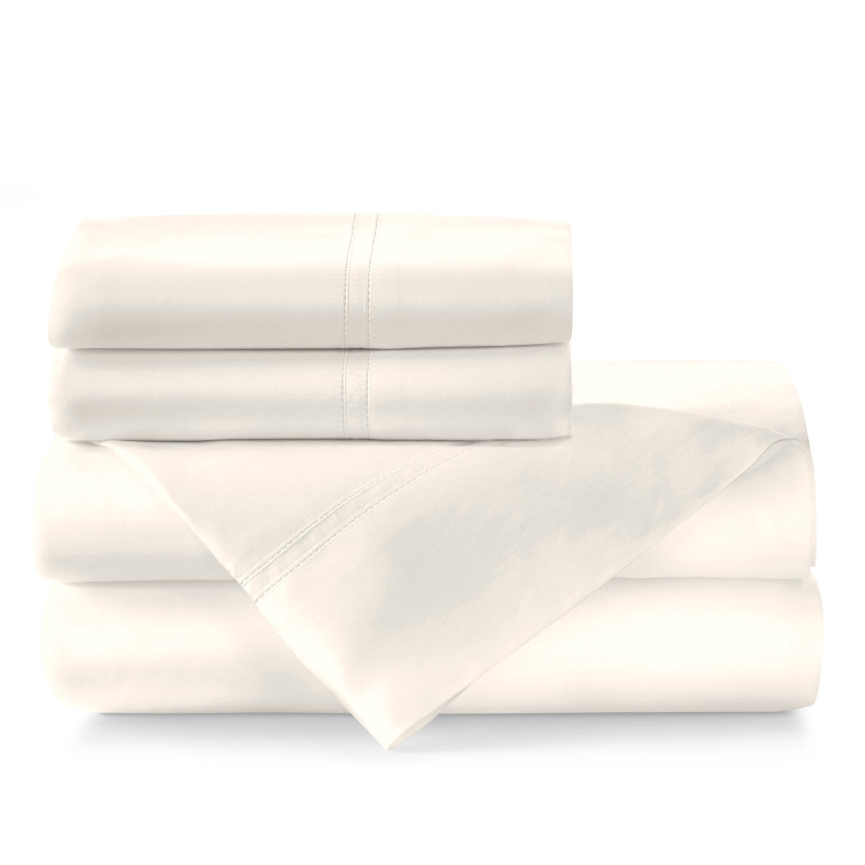 Peacock Alley Lyric Sheet Set featuring soft, cream-colored fabric neatly folded and stacked.