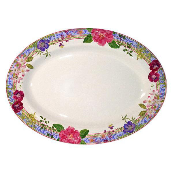 Gien Millefleurs oval platter featuring a floral design with vibrant pink, purple, and green accents on a white background.