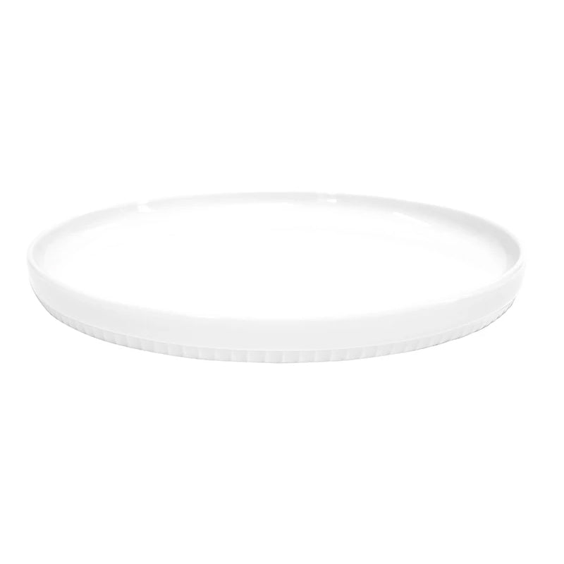 Set of two Pillivuyt Toulouse 10-inch white plates with a smooth surface and subtle ribbed edge design.