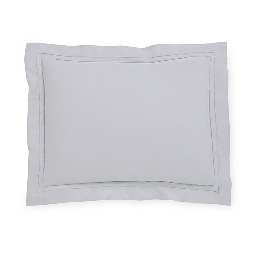 Sferra Finna pillow sham in soft gray with a delicate stitched border, perfect for elegant bedding decor.