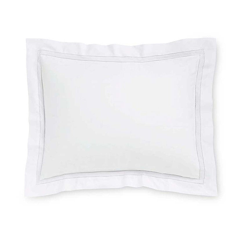 Sferra Finna pillow sham featuring a clean white design with a subtle gray border, perfect for elegant bedding.