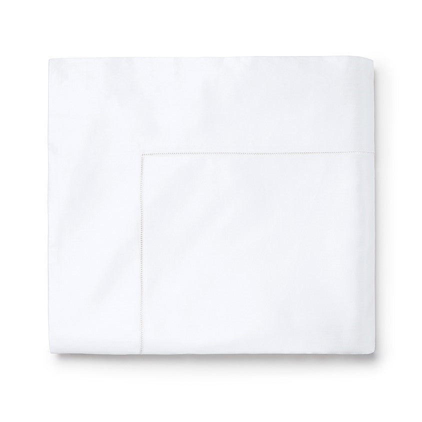 Sferra Giza 45 sateen flat sheet in crisp white with subtle stitching detail, showcasing luxurious fabric quality.