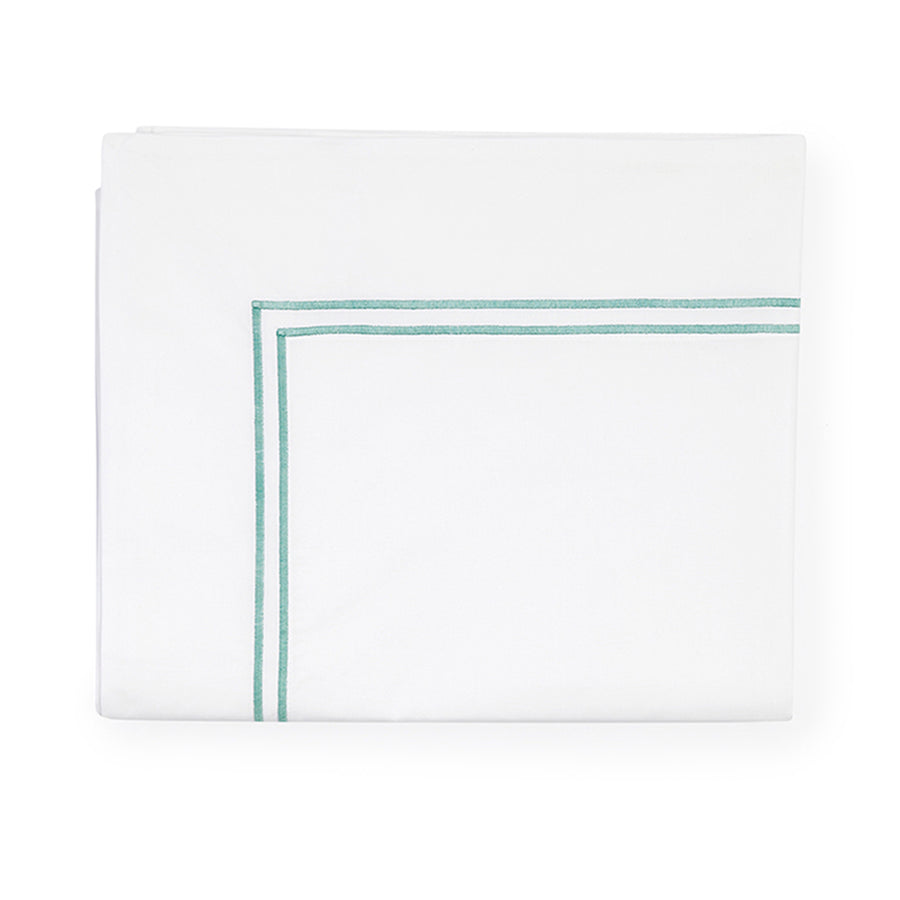 Sferra Grande Hotel flat sheet in white with a subtle turquoise border, showcasing a clean and elegant design.