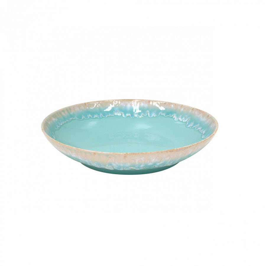 Casafina Taormina pasta serving bowl featuring a vibrant turquoise interior and a textured, light-colored rim.