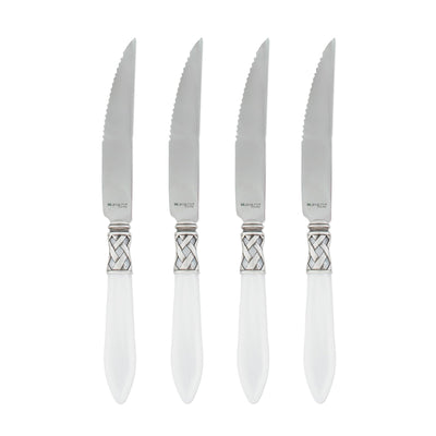 Set of four Vietri Aladdin Antique steak knives featuring stainless steel blades and intricately designed handles.